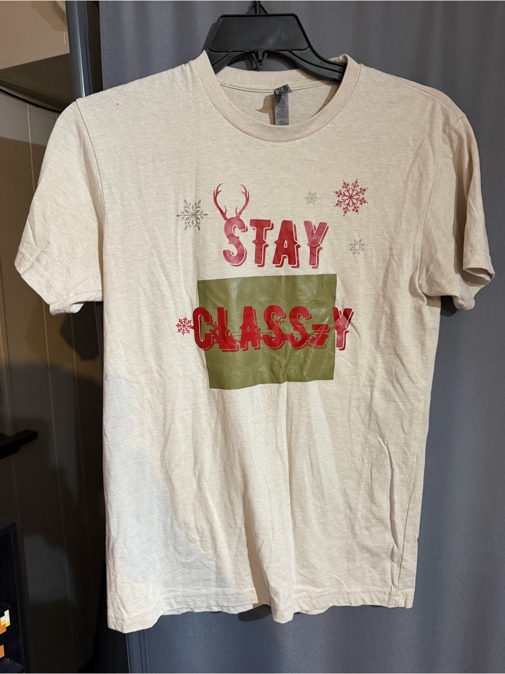 Next Level Apparel Men's Cream Tee with Holiday Motif